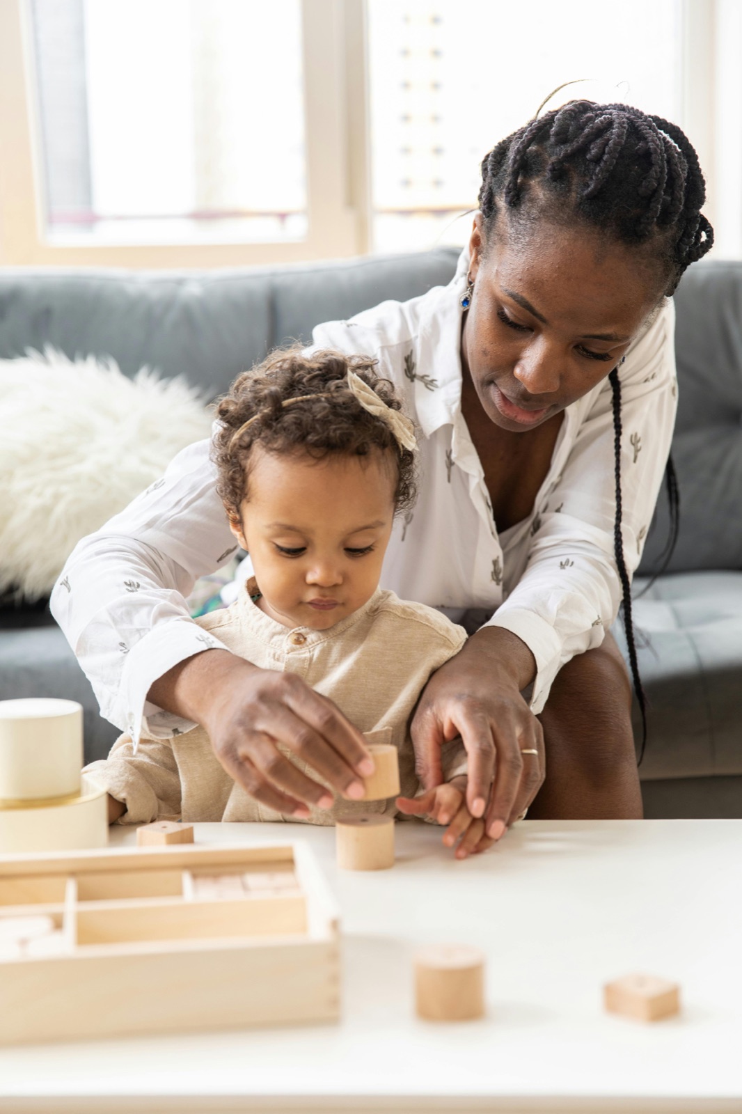 Parent playing with a toddler